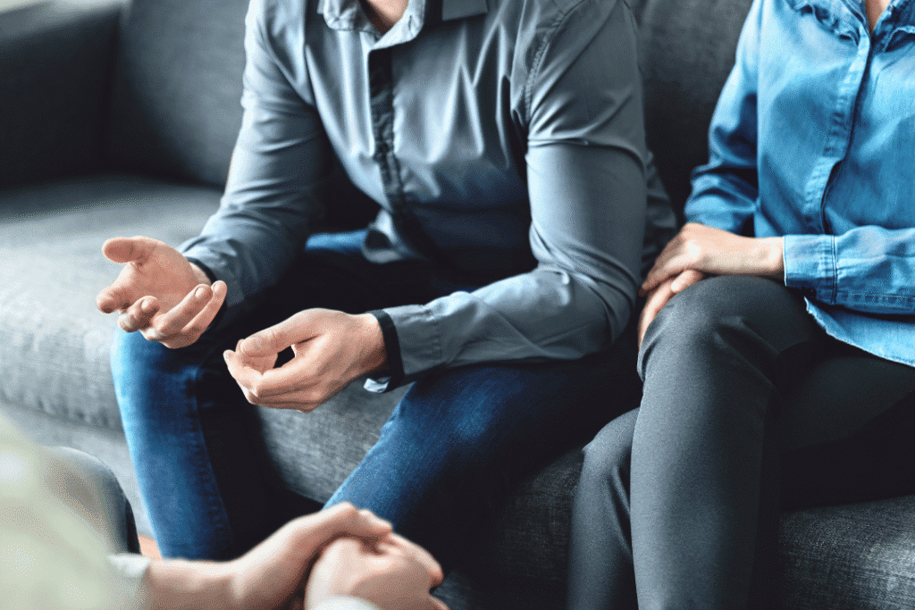 Injury lawyer with couple in consultation